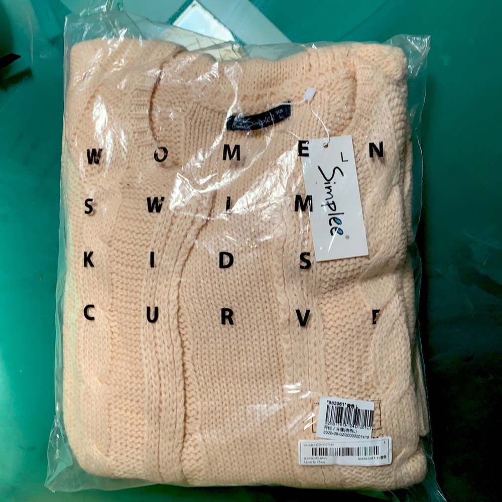 Brand new knit cardigan ,never worn . Size Large